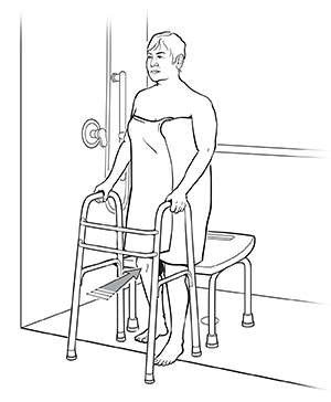 Woman getting into shower stall with a walker. Arrow shows how to move leg back against shower chair edge.