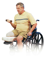 Man with amputated leg sitting in wheelchair exercising with hand weight.