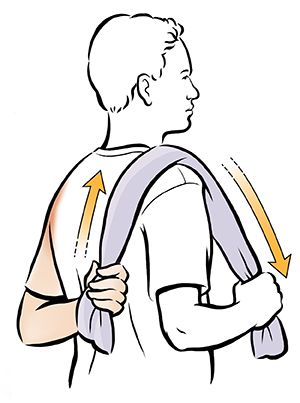 Man doing back scratcher shoulder exercise.
