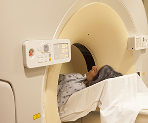 Woman having CT scan.