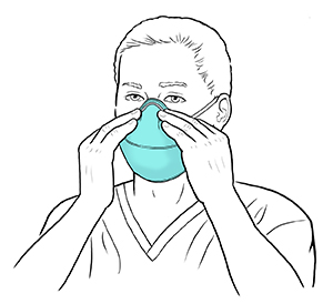 Healthcare provider putting mask over nose and mouth.