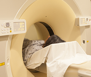 Person having CT scan.